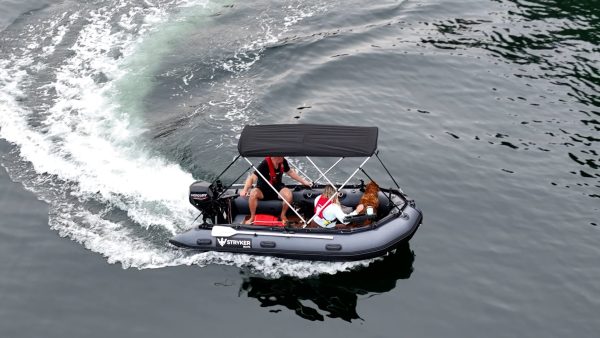 inflatable boat with bimini sunshade exploring the waters of British Columbia Canada