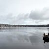 grey inflatable boat with EVA foam on aluminum floor in the lake with man woman and dog