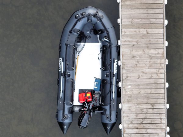 inflatable boat tied to a dock