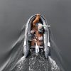 grey inflatable boat with EVA foam on aluminum floor in the lake with man woman and dog