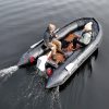 grey inflatable boat with EVA foam on aluminum floor in the lake with man woman and dog