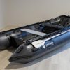 grey inflatable boat in showroom with new Stryker Logo 2024