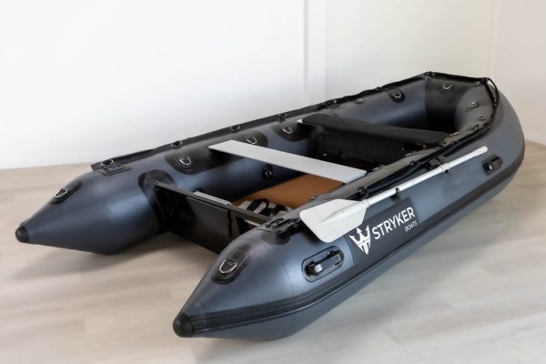 view inside of dark grey inflatable boat with high pressure airmat floor covered in Tan EVA foam.