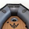 view inside of bow area dark grey inflatable boat with high pressure airmat floor covered in Tan EVA foam.