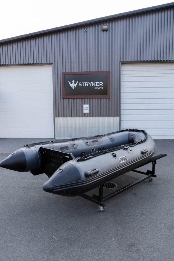 storm grey rigid hull rib inflatable boat with 20" aluminum transom outside Stryker Boats head office