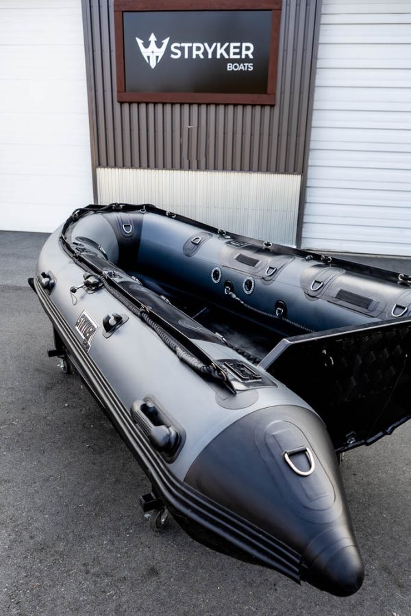 storm grey rigid hull rib inflatable boat with 20" aluminum transom outside Stryker Boats head office