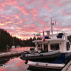 boat docked for the night with at the start of a beautiful sunset