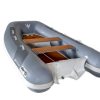 grey inflatable rigid hull inflatable boat with EVA foam on bench seats and floor. bow locker in front of boat also covered in Eva foam