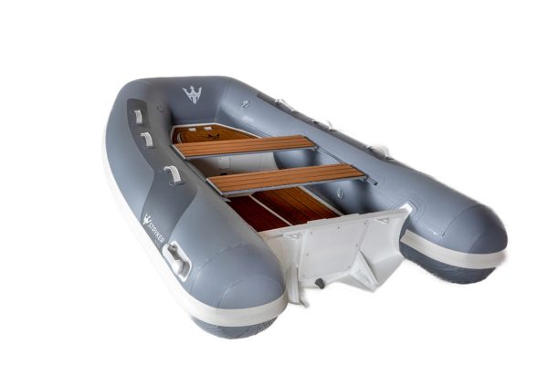 grey inflatable rigid hull inflatable boat with EVA foam on bench seats and floor. bow locker in front of boat also covered in Eva foam