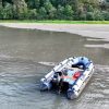 grey inflatable jet boat on the rivers of British Columbia Canada