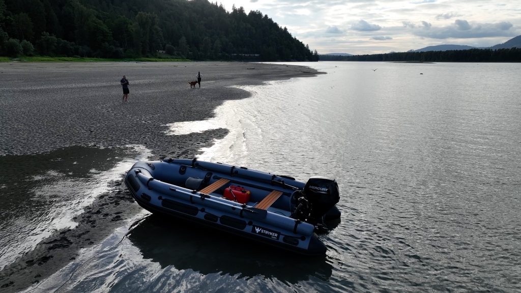 grey inflatable jet boat on the rivers of British Columbia Canada