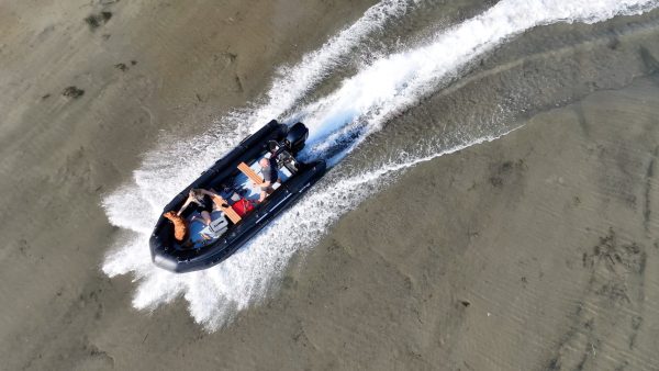 black inflatable jet boat with mercury outboard from beautiful British Columbia