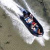 black inflatable jet boat with mercury outboard from beautiful British Columbia