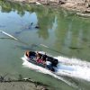 black inflatable jet boat with mercury outboard from beautiful British Columbia