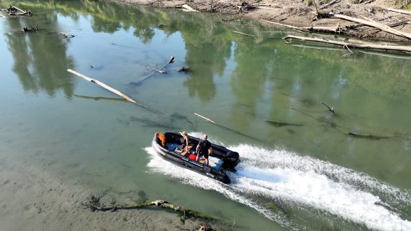 black inflatable jet boat with mercury outboard from beautiful British Columbia