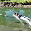 black inflatable jet boat with mercury outboard from beautiful British Columbia