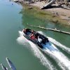 black inflatable jet boat with mercury outboard from beautiful British Columbia