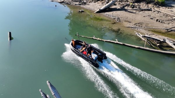 black inflatable jet boat with mercury outboard from beautiful British Columbia