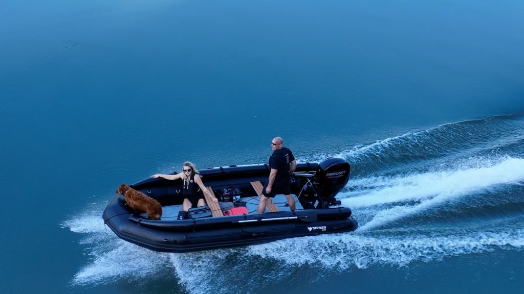 black inflatable jet boat with mercury outboard from beautiful British Columbia