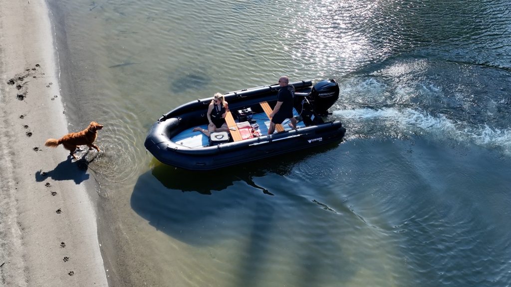 black inflatable jet boat with mercury outboard from beautiful British Columbia